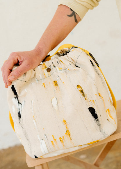 Bolso ama orbanak amarillo